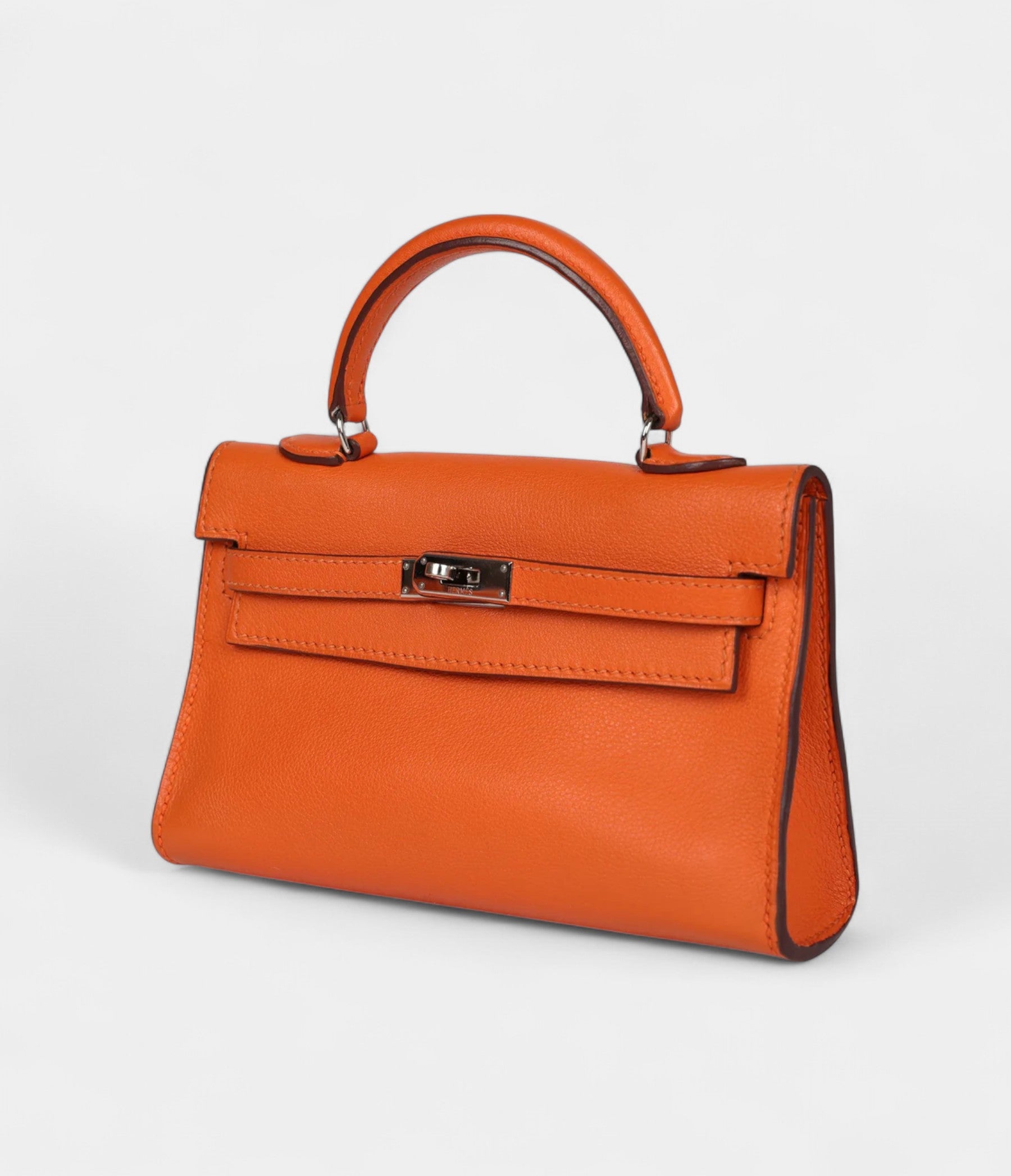 Hermès Micro Kelly 15 Orange Swift Palladium Hardware